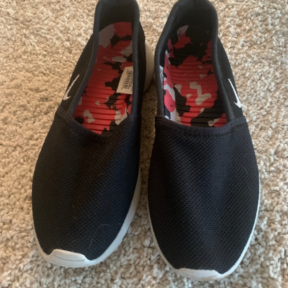 Like new Nike slip on shoes, size 8, womens